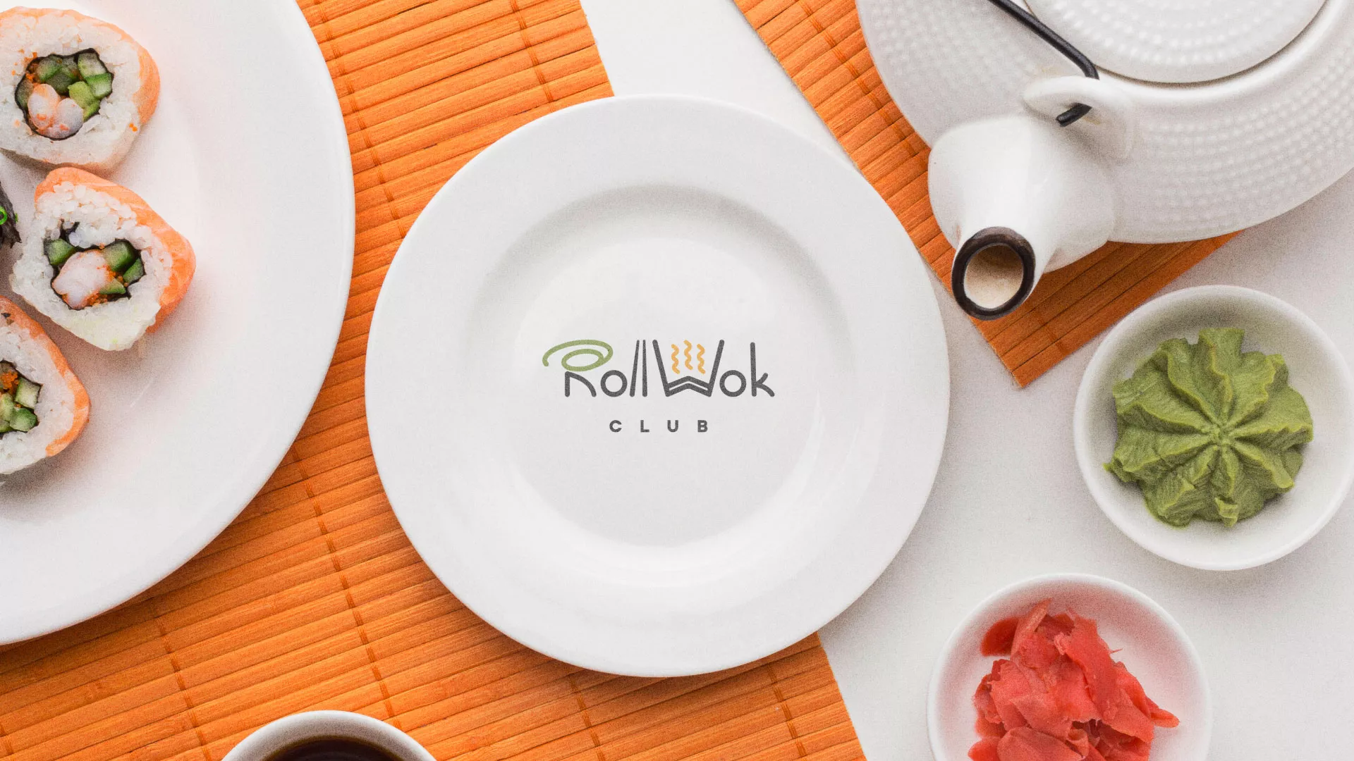 Разработка логотипа и фирменного стиля в Сибае для суши-бара «Roll Wok Club» Разработка логотипа и фирменного стиля в Сибае для суши-бара «Roll Wok Club»